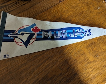 Vintage MLB Toronto Blue Jays felt pennant.  full size with small stains