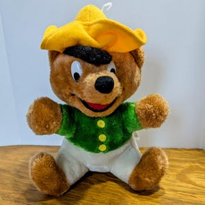Vintage Warner Bros Speedy Gonzalez plush, 9" tall. Product of the 24K Company. Good shape for its age, with slight wear.