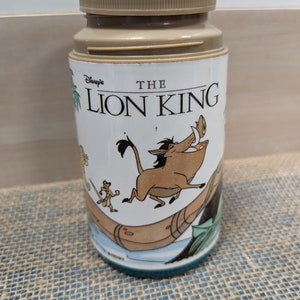 Vintage Disney the Lion King Aladdin thermos.  8oz, missing the outer lid.