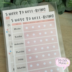 May include: A printable checklist with the title "5 Ways to Well-Being" with a pink background and white circles for marking off daily tasks. The checklist includes days of the week, Monday through Saturday, and five categories: Connect, Be Active, Learn, Give, and Take Notice.
