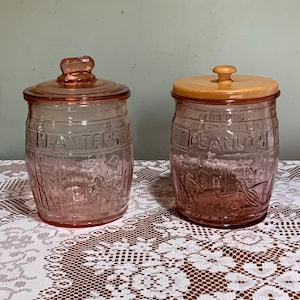 Vintage and Rarer 1940’s Planters Peanuts- “Mr Peanut” 3D Embossed Large 10.5” Tall Pink Depression Glass Barrel Shaped Lidded Store Jar