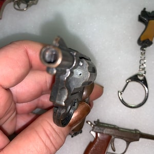 Vintage 1950’s-1980’s-collection of NINE Cap Gun Key Chains in Shadow ...