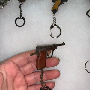 Vintage 1950’s-1980’s-collection of NINE Cap Gun Key Chains in Shadow ...
