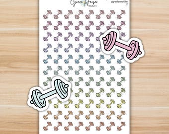 May include: A sticker sheet featuring rows of small, colorful dumbbell icons in various pastel shades. Two larger, die-cut dumbbell stickers in light pink and light blue are placed over the sheet. The text Grace Harper Stickers is at the top.