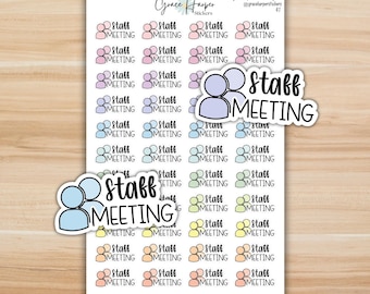 May include: A sticker sheet featuring multiple rows of small, colorful icons of two overlapping circles representing people, accompanied by the black text "staff MEETING". Two larger, die-cut versions of the same sticker are placed on top.