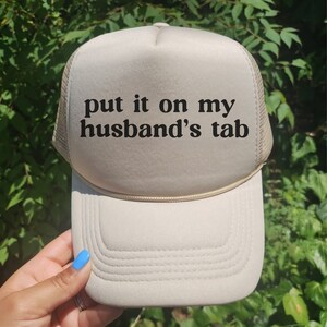 Put It On My Husband’s Tab Hats, Put It On My Husband’s Tab Caps, Gift for Wife, Gift for Bride, Woman&#39;s Trucker Hat, Husband Hat, Wifey Hat
