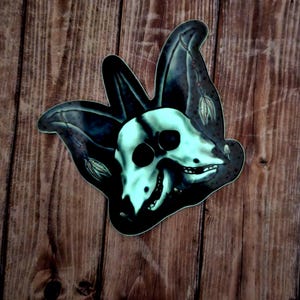 Glow in the dark 2 headed goat skull sticker for water bottle, creepy gift for oddity lover, spooky season sticker for laptop, macabre