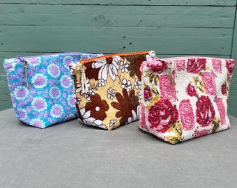 Vintage toweling zipped pouch. Lined with more pretty vintage fabric. Ideal for makeup, toiletries, crafts and more. Upcycled and eco.