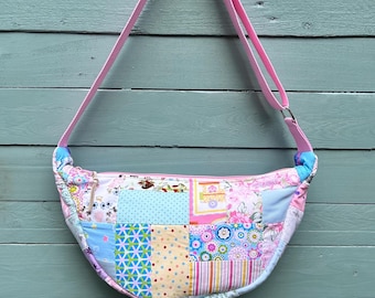 Round cross body/shoulder bag, handmade from a quilted patchwork throw. Fabulous vintage lining. 2 slip pockets. Upcycled & vintage fabric.