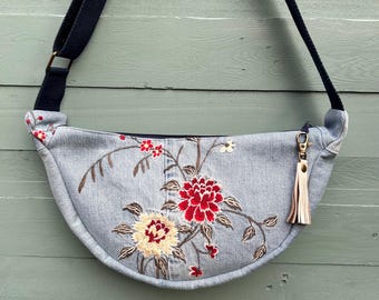 Embroidered denim cross body bag, with fabulous vintage lining. Two slip pockets. Eco, upcycled fabric.