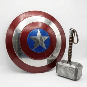 Captain America shield made of steel, featuring red, white, and blue rings with a central star for cosplay and display.
Thor Mjolnir themed hammer crafted from metal, not a magical weapon.
Thor hammer Mjolnir replica made of metal with a premium metallic look.
Metal replica of Thor’s Mjolnir hammer designed for decorative purposes.
Thor Mjolnir inspired metal hammer suitable for cosplay events and collections.
God of Thunder Thor hammer Mjolnir made of metal for display and costume use.