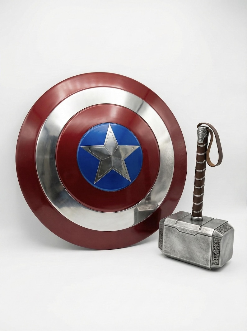 Captain America shield made of steel, featuring red, white, and blue rings with a central star for cosplay and display.
Thor Mjolnir themed hammer crafted from metal, not a magical weapon.
Thor hammer Mjolnir replica made of metal with a premium metallic look.
Metal replica of Thor’s Mjolnir hammer designed for decorative purposes.
Thor Mjolnir inspired metal hammer suitable for cosplay events and collections.
God of Thunder Thor hammer Mjolnir made of metal for display and costume use.
