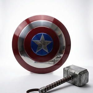 Steel Captain America shield with a polished metallic finish, inspired by the iconic superhero design.
Mjolnir hammer inspired by Thor, made of metal for display and cosplay use.
Metal Thor Mjolnir hammer featuring a realistic design and sturdy construction.
Captain America style steel shield with red, white, and blue detailing for cosplay use.
Steel replica of Captain America’s shield designed for decorative and cosplay purposes.