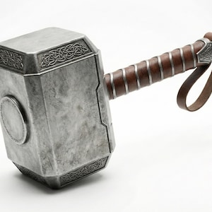 Thor Mjolnir hammer replica made of metal with a realistic finish for cosplay and display.