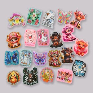 May include: A collection of colorful, cartoon-style decorative charms featuring various animals, butterflies, and text. Designs include a turtle, cow, duck, and deer, with phrases like "I am just a girl" and "Fixer of all things".