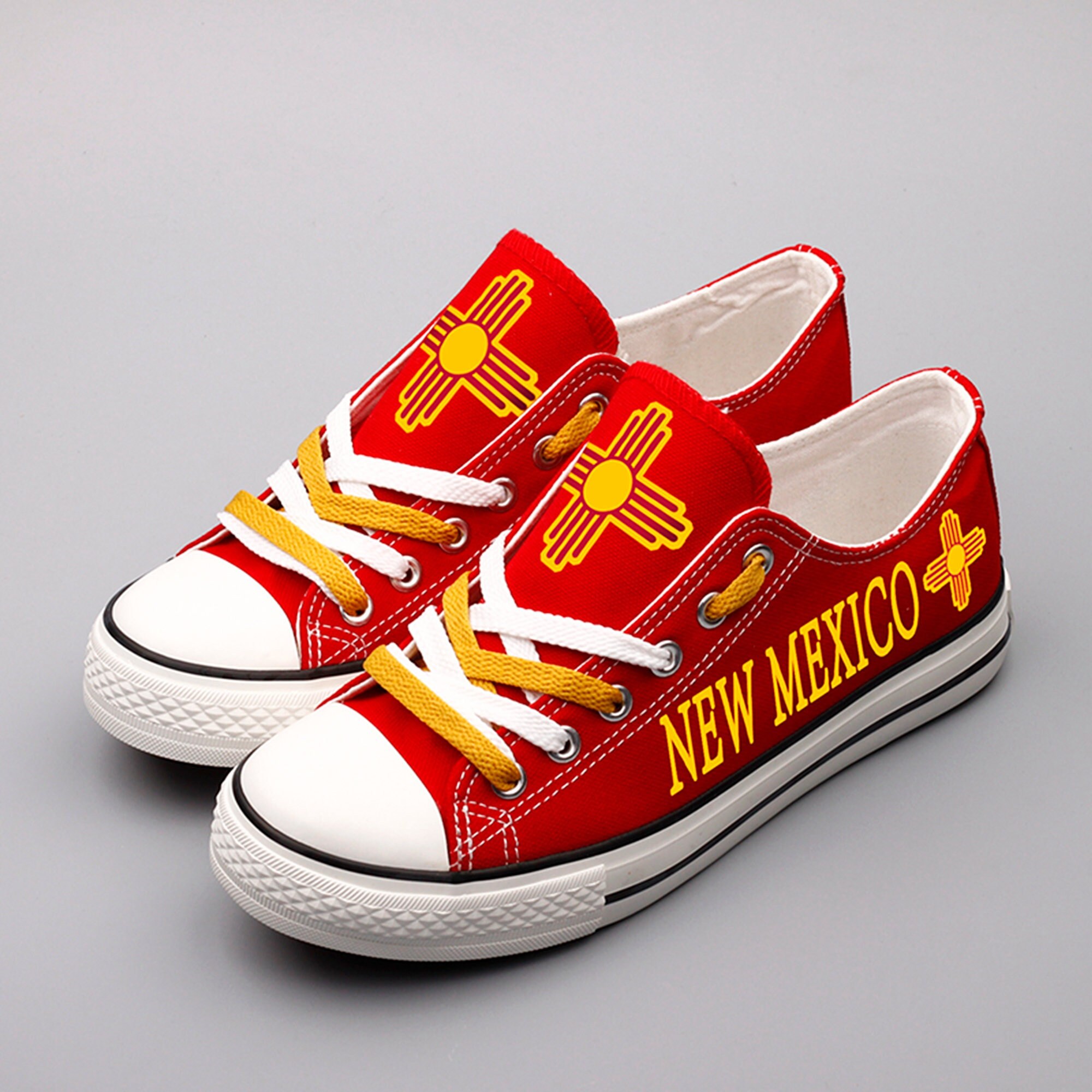 Zapatillas deportivas de New Mexico State: zapatillas bajas de lona roja