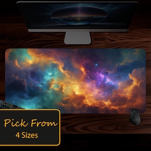May include: A colorful galaxy-themed desk mat with a nebula pattern in shades of orange, blue, and purple. The mat is on a wooden surface with a computer monitor and a mouse. The text "Pick From 4 Sizes" is on a black rectangle.
