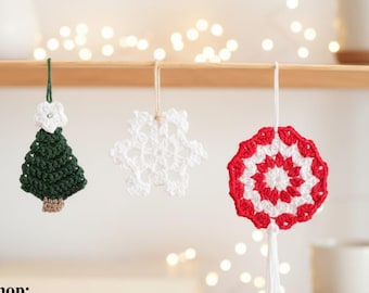May include: Three crochet ornaments hanging from a shelf: a dark green Christmas tree with a white star, a white snowflake, and a red and white circular peppermint-style ornament with a white tassel. Text reads: Shop: TheSweetestCrochetPT.