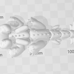 May include: A white, stylized, segmented sculpture resembling a sea creature. The sculpture is approximately 100 mm long and features rounded, textured segments with small, protruding details. The design is symmetrical and appears to be 3D-printed.