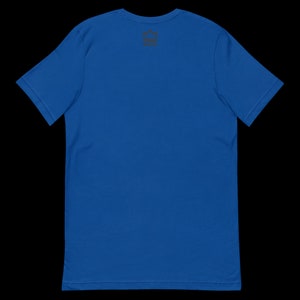 May include: A royal blue t-shirt with a small black crown logo on the back.