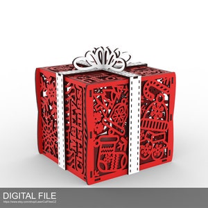 Pode incluir: Uma caixa de presente vermelha, cortada a laser de forma intrincada, com uma fita e um laço brancos. A caixa é decorada com desenhos natalinos, incluindo flocos de neve, bengalas de doces e as palavras "Feliz Natal".