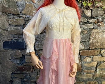 Shiny pink dress with short jacket