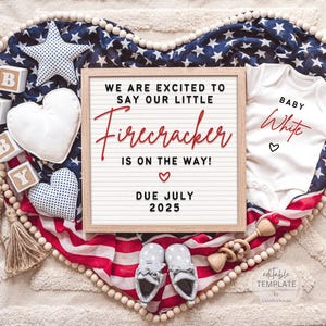 May include: A pregnancy announcement with a red, white, and blue theme. A letter board says "We are excited to say our little Firecracker is on the way! Due July 2025". A white onesie says "Baby White" in red lettering.