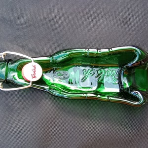 Slumped Grolsch beer bottle, glass art, ashtray, coin holder, spoon rest, spoon holder, slumped green bottle, upcycled/repurposed bottle art
