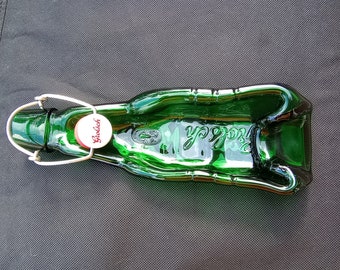 Slumped Grolsch beer bottle, glass art, ashtray, coin holder, spoon rest, spoon holder, slumped green bottle, upcycled/repurposed bottle art