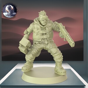 Könnte beinhalten: Detaillierte Miniaturfigur eines futuristischen Kriegers, bekleidet mit einer Steppweste, einer Brille und einer Kampfhose. Die Figur hält eine große Waffe und ein mechanisches Gerät. Die Basis trägt den Text "3D Bagratum Miniatures".