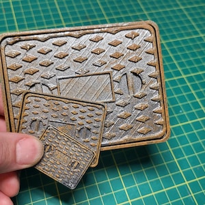 Manhole cover for diorama