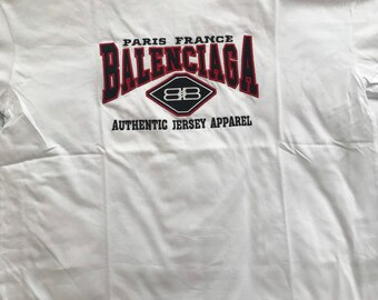 BALENCIAGA 刺繍 フード付きポンチョ - メルカリ