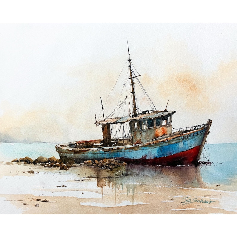 May include: A watercolor painting of a weathered fishing boat resting on a sandy shore. The vessel features a blue hull with a red bottom, a cabin with dark windows, and a tall mast. The artist's signature, Joe Schaub, is visible in the corner.
