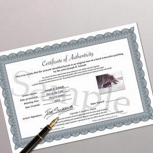 May include: A certificate of authenticity for a watercolour painting titled "Out in the Cold" by Joseph R. Schaub. The painting size is 25.4 x 35.6 cm and was created in 2024. The certificate includes the artist's signature and contact information.