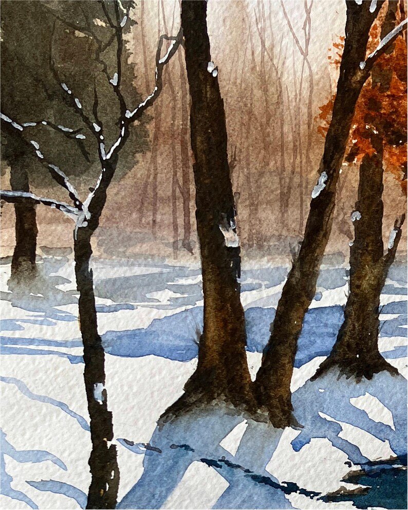 May include: Watercolor painting of a winter forest scene. The foreground features dark brown tree trunks and branches with patches of snow. The ground is covered in snow with blue shadows, and the background shows a hazy, light-brown forest.