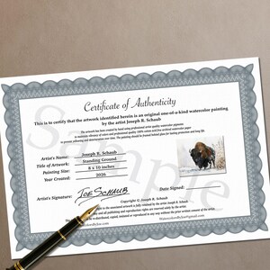 May include: A white Certificate of Authenticity with a grey decorative border, featuring the text "Certificate of Authenticity," artist name Joseph R. Schaub, title "Standing Ground," 8 x 10 inches size, year 2026, and a small bison painting.