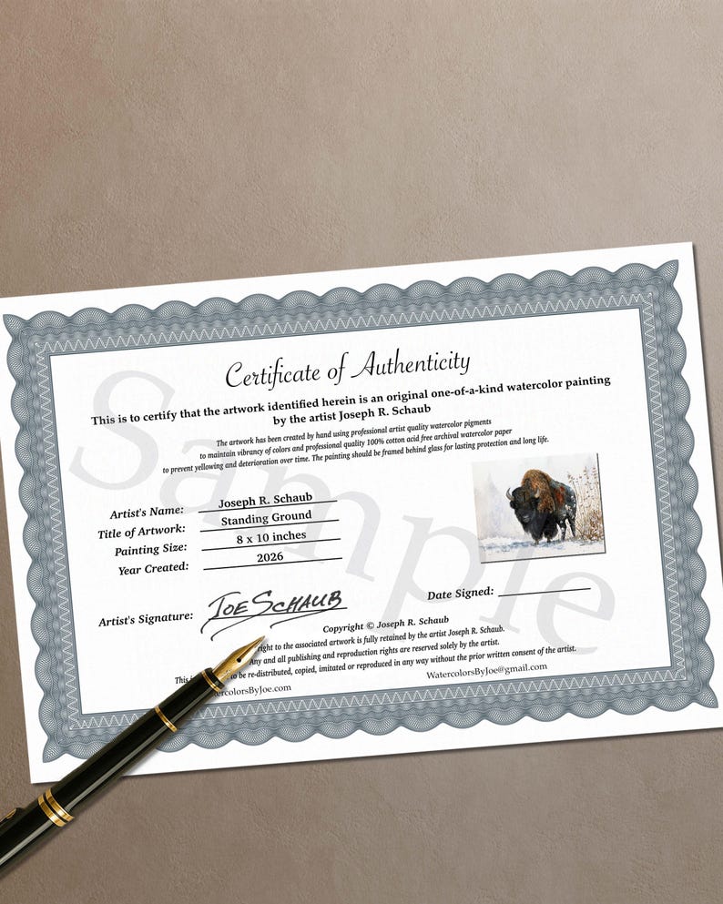 May include: A white Certificate of Authenticity with a grey decorative border, featuring the text "Certificate of Authenticity," artist name Joseph R. Schaub, title "Standing Ground," 8 x 10 inches size, year 2026, and a small bison painting.