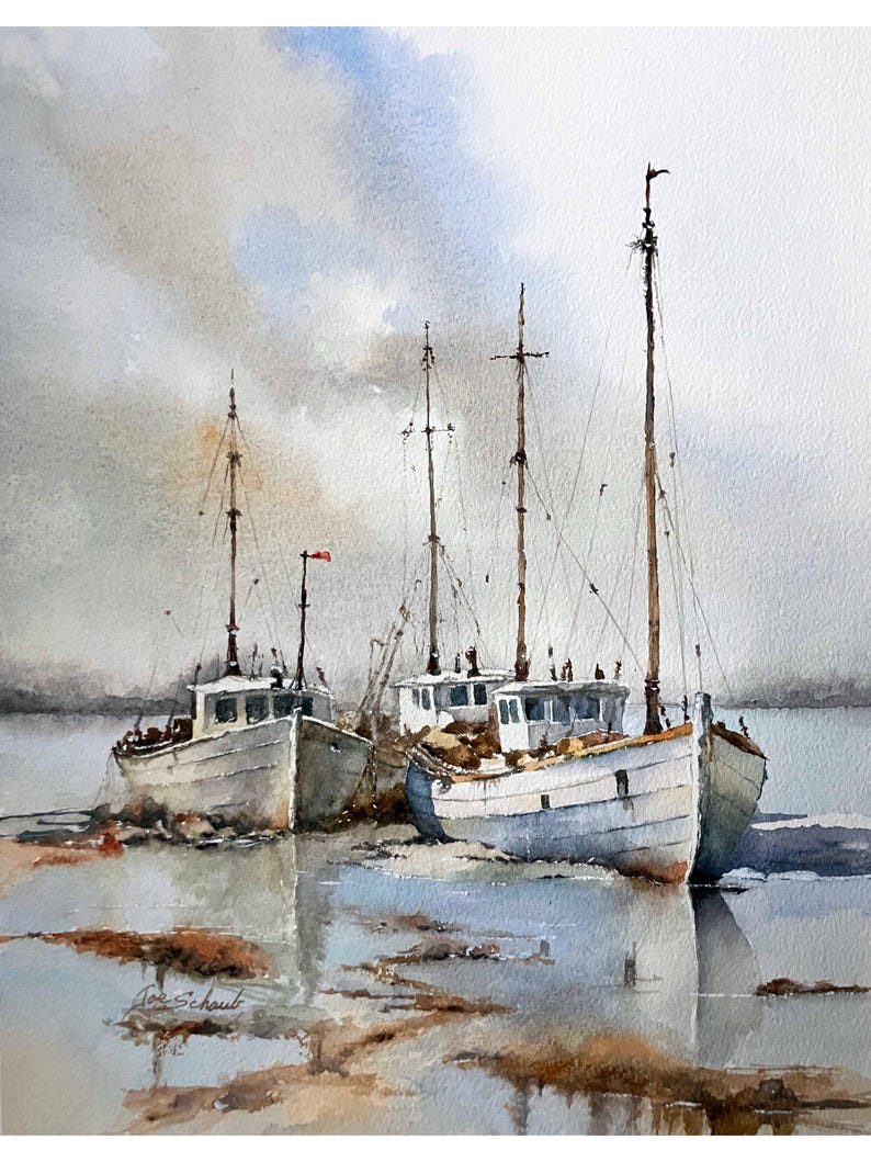 May include: A watercolor painting depicts two white fishing boats moored in shallow water. The vessels feature tall masts and weathered hulls, resting on a sandy, muddy shoreline under a soft, overcast sky. The artist's signature is visible.
