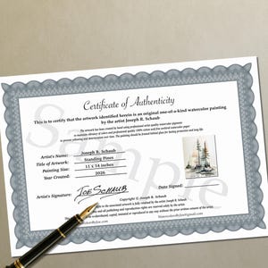 May include: A Certificate of Authenticity document with a gray decorative border, featuring the text Standing Pines, artist Joseph R. Schaub, and the year 2026. A small image of a pine tree watercolor painting is included, alongside a black fountain pen.