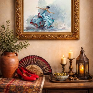 May include: A framed watercolor painting of a dancer in a flowing blue dress with red accents. The painting hangs above a table with red heels, a fan, candles, and a decorative lantern. A vase with greenery is on the left.