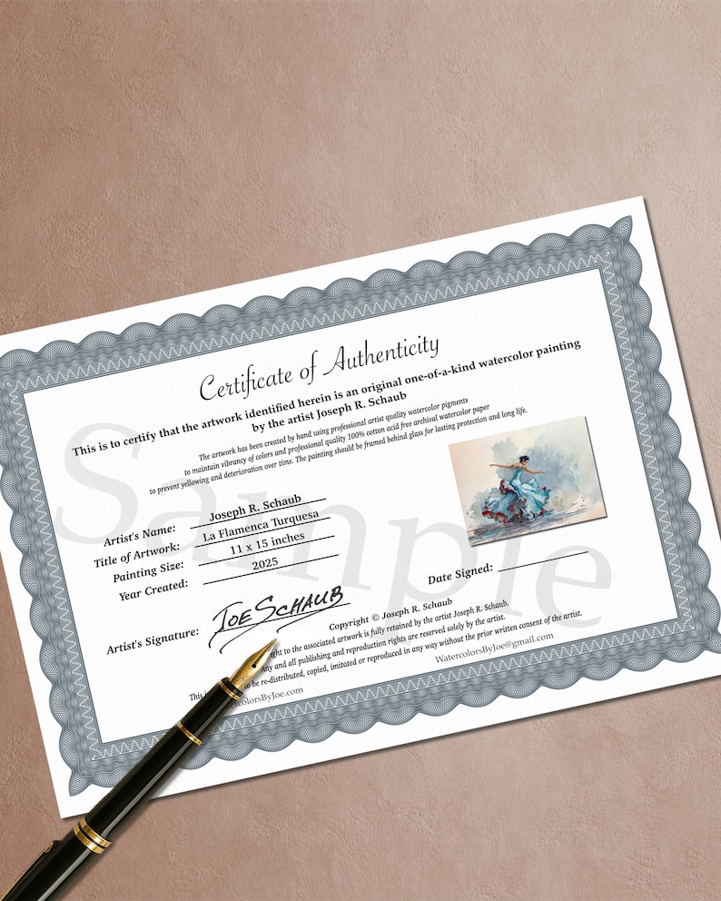 May include: A certificate of authenticity for a watercolor painting by Joseph R. Schaub. The certificate includes the painting's title, "La Flamenca Turquesa," and dimensions of 11 x 15 inches. A pen rests on the certificate.