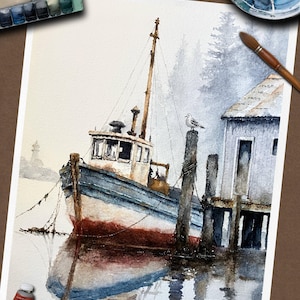 May include: A watercolor painting depicting a fishing boat moored at a wooden dock in a misty harbor. The boat features a white cabin, blue hull, and red bottom. A seagull sits on a piling near a weathered building, with a lighthouse visible in the distance.
