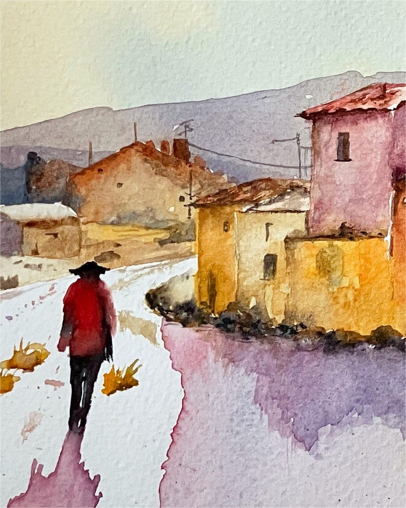 May include: Watercolour painting of a person in a red jacket walking along a road in a village. Buildings are painted in yellow, orange, and pink. A mountain range is in the background. The artwork has a soft, impressionistic style.