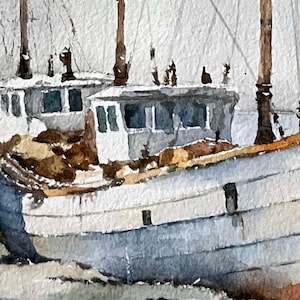 May include: A watercolor painting depicting two white fishing boats docked side by side. The vessels feature brown masts, dark blue windows, and textured hulls. The scene is rendered with visible brushstrokes on paper, capturing the boats.