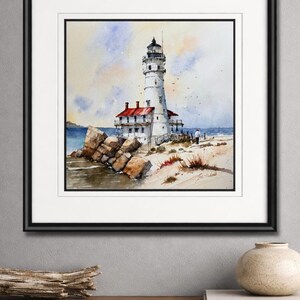K&ouml;nnte beinhalten: Aquarellmalerei eines wei&szlig;en Leuchtturms mit schwarzem Dach und rotem Dach, an einer felsigen K&uuml;ste gelegen. Das Kunstwerk ist schwarz gerahmt und zeigt eine ruhige K&uuml;stenlandschaft mit blauem Wasser und einem Sandstrand.
