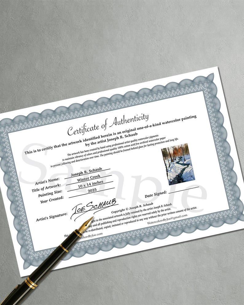 May include: A certificate of authenticity for a watercolor painting titled "Winter Creek" by Joseph R. Schaub. The painting size is 10 x 14 inches and was created in 2025. The certificate includes the artist's signature and copyright information.