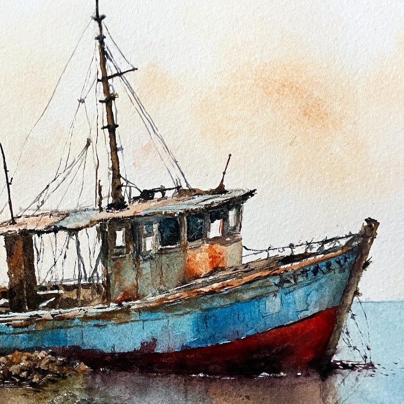 May include: A watercolor painting of a weathered fishing boat with a blue hull and a red bottom. The vessel features a tall mast, rigging, and a cabin with dark windows. The background is a soft, muted wash of light orange and beige tones.