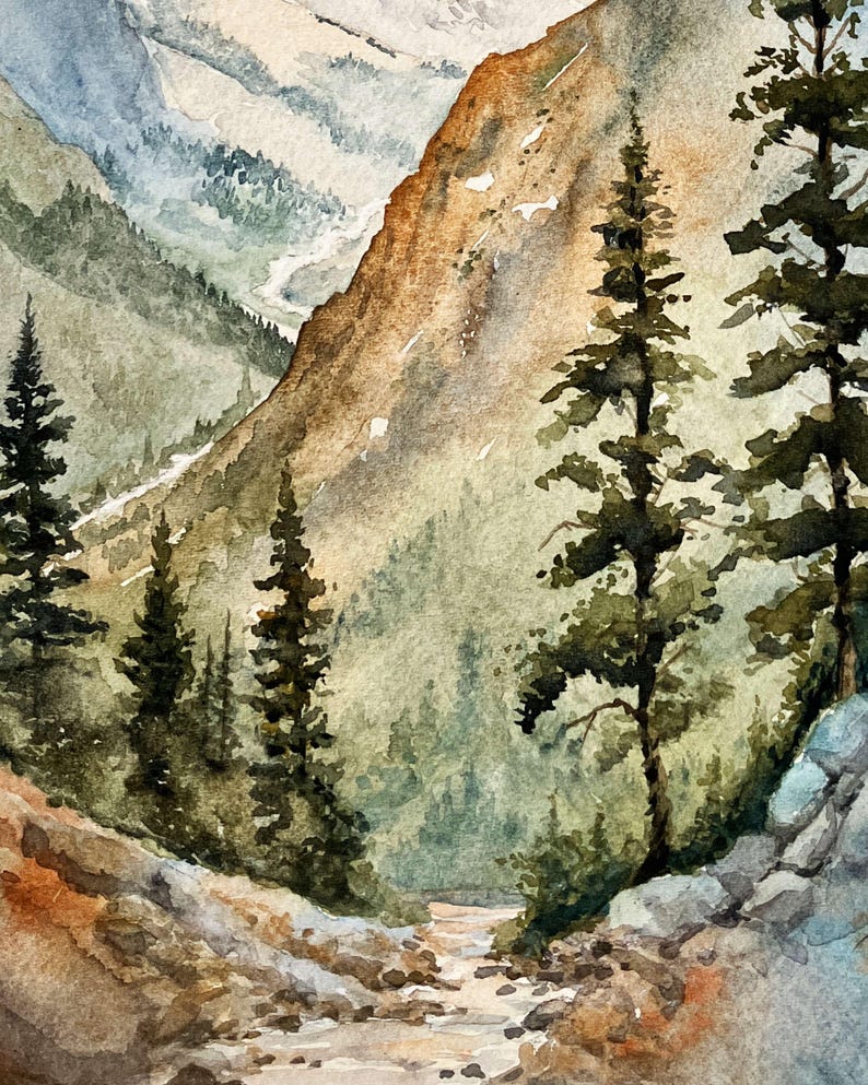 May include: Watercolor painting of a mountain landscape. The artwork depicts a valley with a river, surrounded by trees and mountains. The color palette includes shades of green, brown, and blue, creating a serene and natural scene.