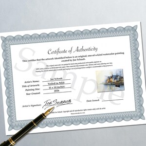 Puede incluir: Un certificado de autenticidad blanco con un borde decorativo azul, que presenta el texto Certificate of Authenticity, el artista Joe Schaub, el t&iacute;tulo Veiled in Mist, 11 x 14 inches, el a&ntilde;o 2026, una firma y una pluma estilogr&aacute;fica negra.