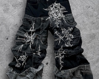 1 of 1 baggy draped denim jeans with 3D art on top
